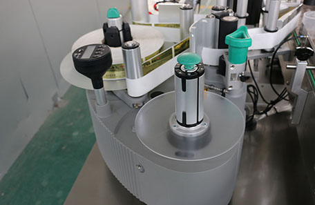 带把手瓶定位贴标机 带把手瓶定位贴标机