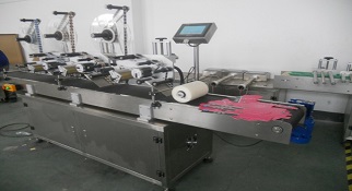 平面不干胶贴标机工作原理介绍
