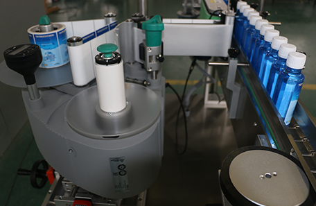 立式蜂蜜瓶贴标机 立式蜂蜜瓶贴标机